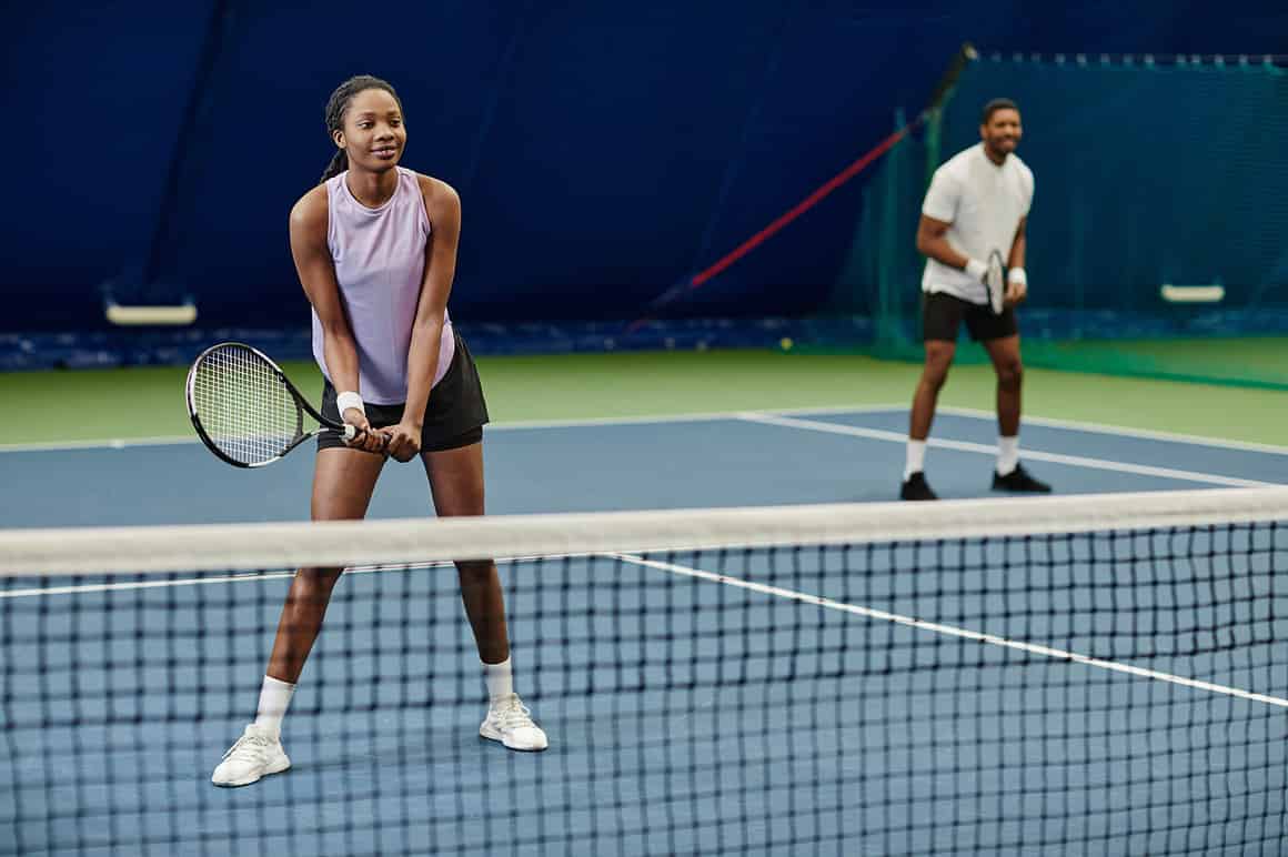 Onde jogar e ter aulas de tênis na Barra da Tijuca – african american couple playing tennis 2022 05 30 23 00 40 utc